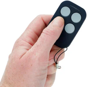 Auto Openers AOTX Remote Control In Hand