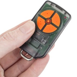 Automatic Technology PTX-5v1 Orange TrioCode Remote Control In Hand
